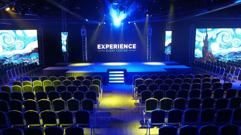 Event hall with stage and chairs set up