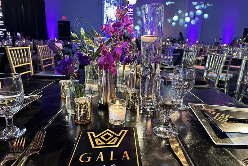 A highly decorated table at a gala