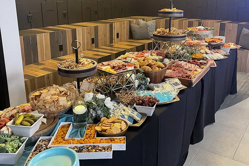 Banquet table packed with food