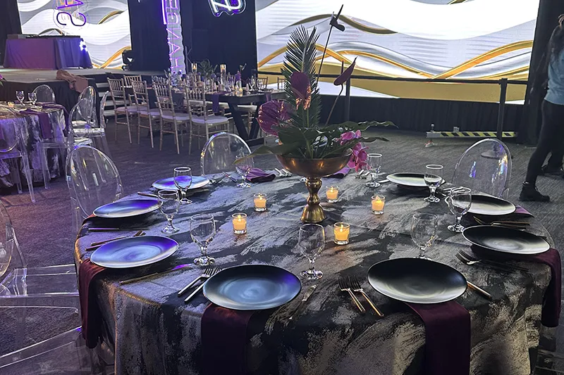 Decorated and set round table at a banquet